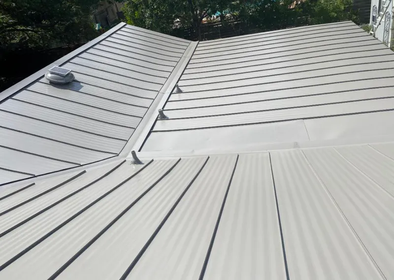 Solar attic fan installed on a metal roof for Roof Ventilation in White Marsh